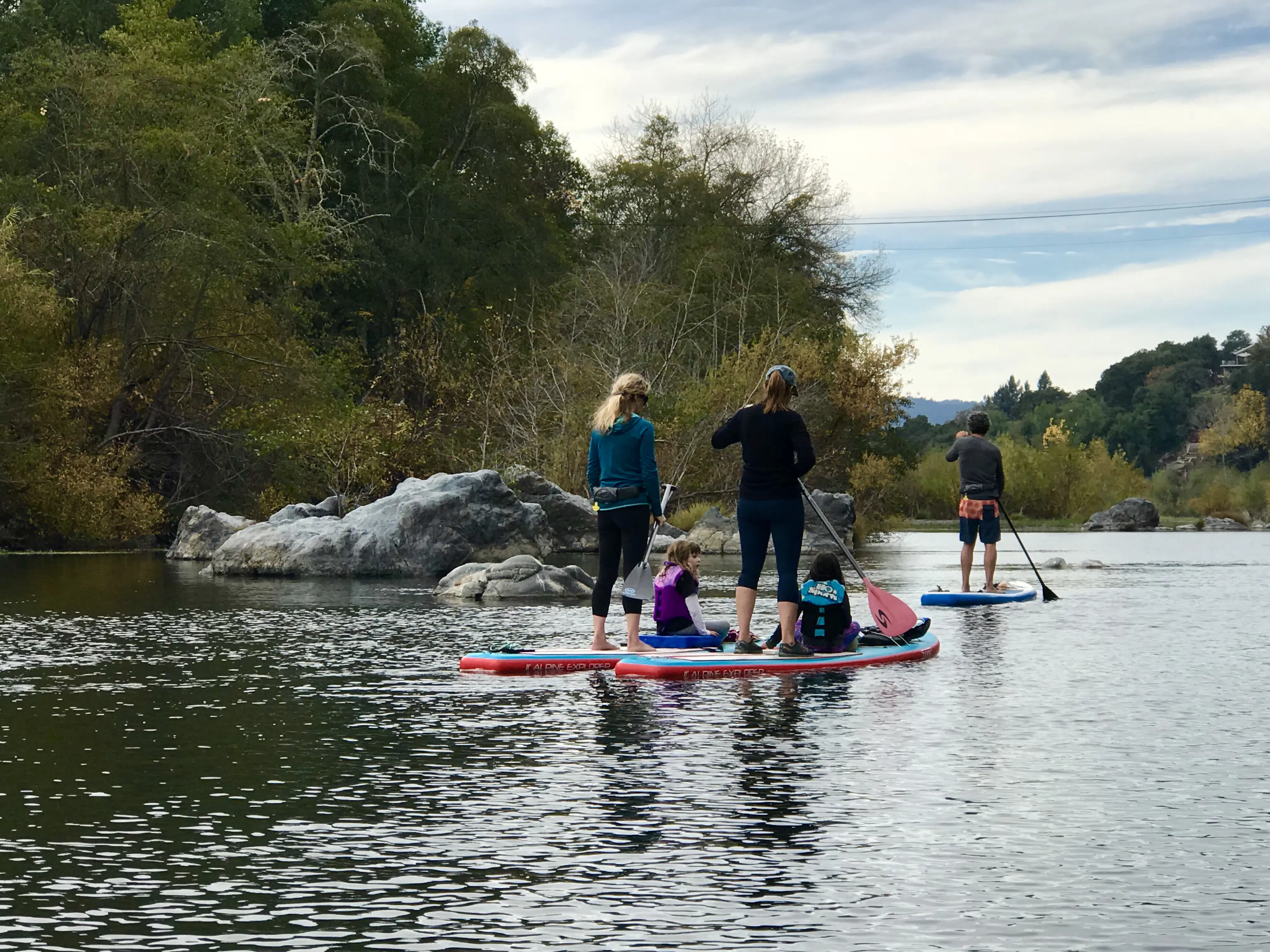 Kids and adults on paddleboards